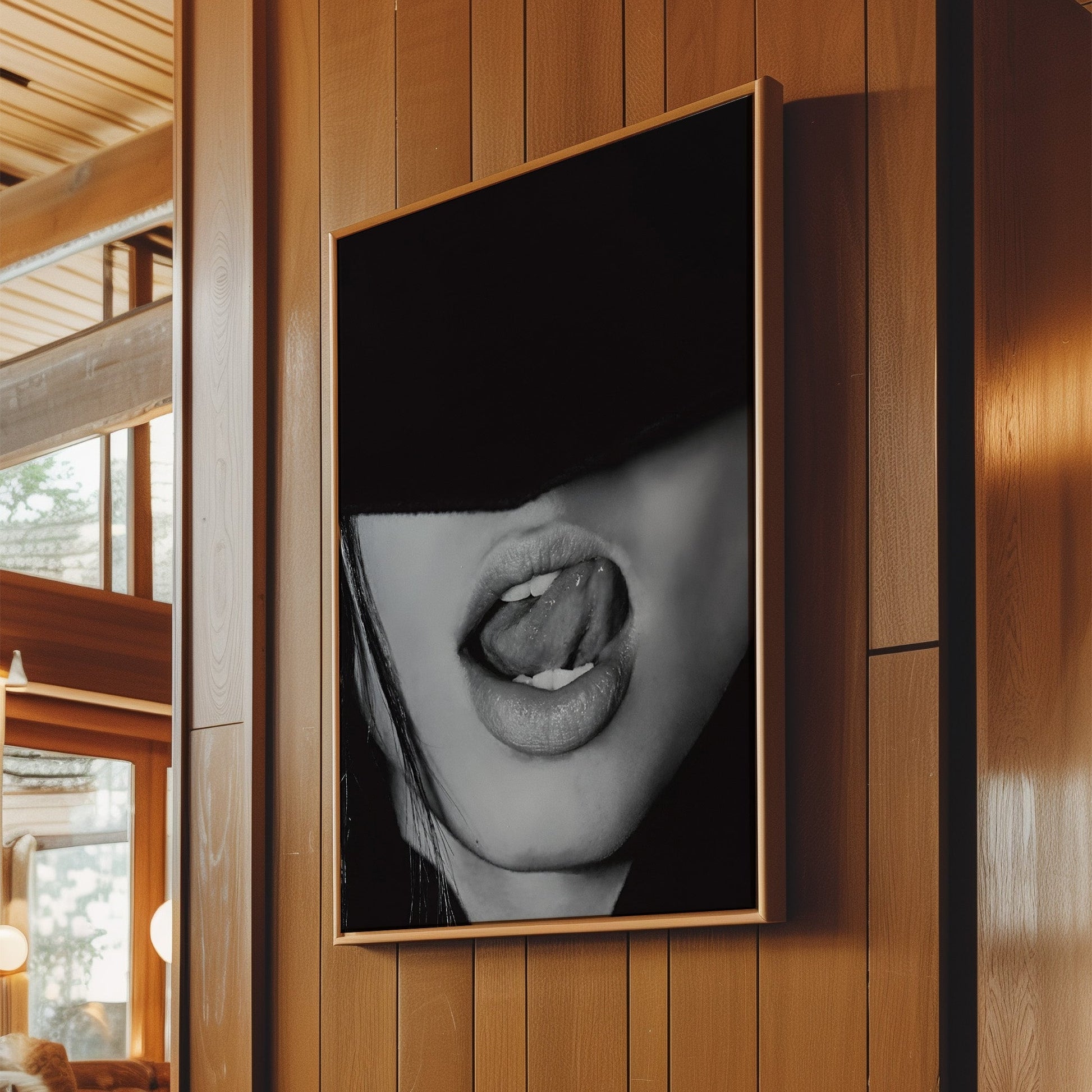 High-end wooden frame showcasing a black-and-white image of a woman licking her lips, evoking sensual fashion themes.